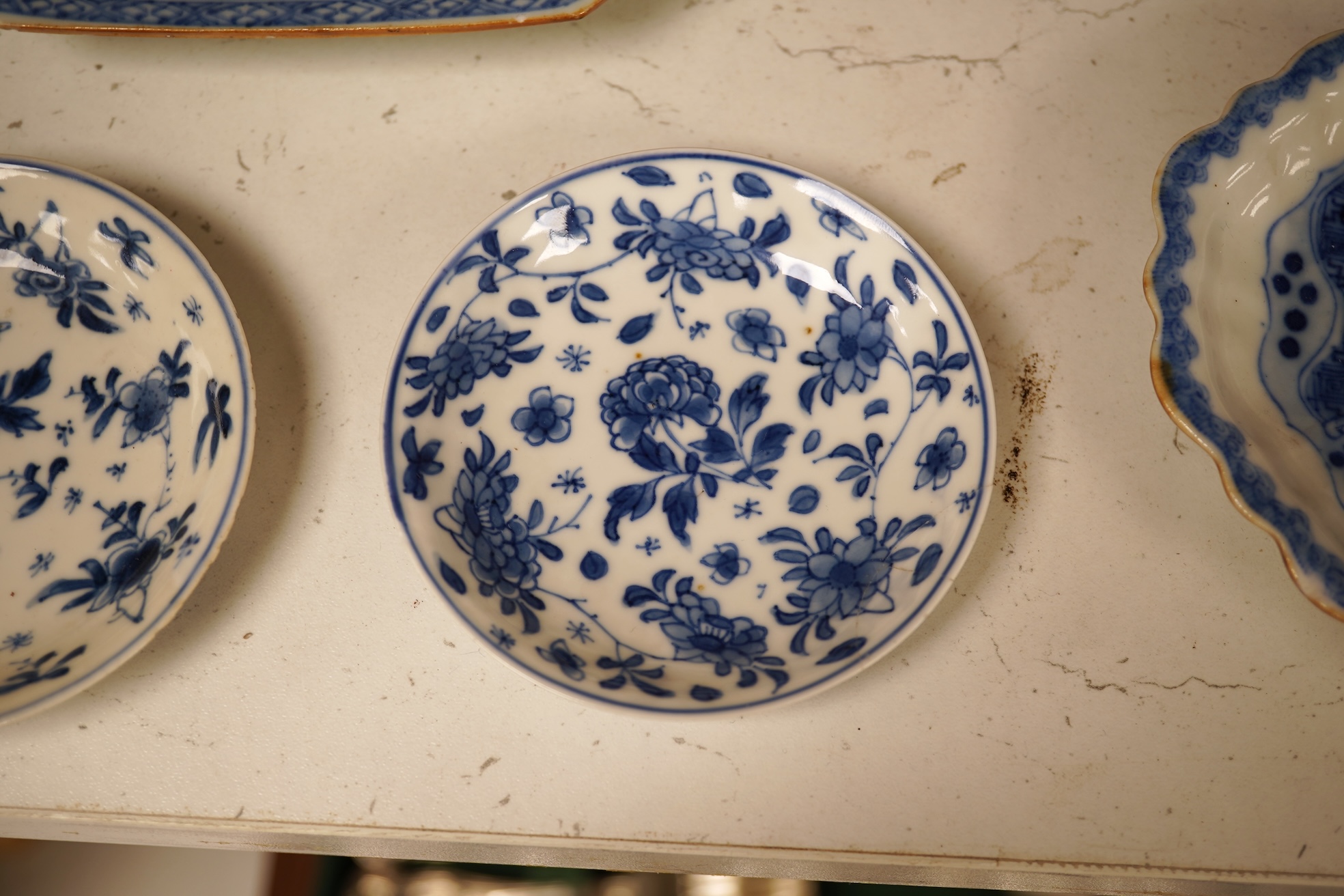 A Chinese export blue and white blue plate, sauceboat and Ko-sometsuke type dish together with a miniature tea bowl and two saucers. Plate 22cm diameter